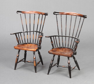 A pair of child's 18th Century style hardwood Windsor stick and bar back kitchen carver chairs 39cm x 17cm x 15cm 
