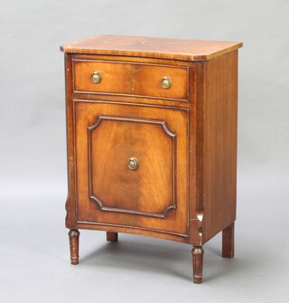 A Georgian style mahogany concave fronted bedside cabinet fitted a drawer above cupboard enclosed by panelled door 72cm h x 51cm w x 33cm d 