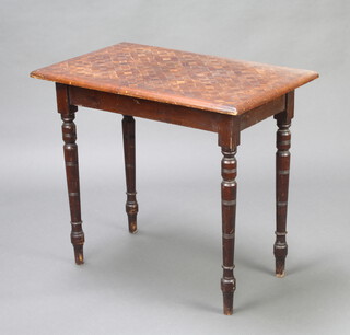 A Victorian pine framed table with parquetry top, raised on turned supports 70cm h x 80cm l x 49cm w  