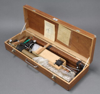 A Tower astronomical telescope model no.6333 F=900MM D=60MM, with tripod stand, Barlow lens, eyepieces etc together with carrying box and instructions 
