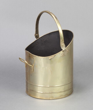 A brass Coal scuttle 