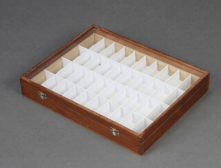 A mahogany table top display cabinet with hinged lid, fitted compartments 7cm h x 42cm w x 33cm d 