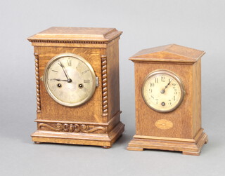 An Edwardian timepiece with paper dial and Arabic numerals contained in an inlaid oak Portico shaped case on bracket feet 25cm h x 18cm w x 12cm d and a striking mantel clock with silvered dial 28cm x 21cm x 13cm 