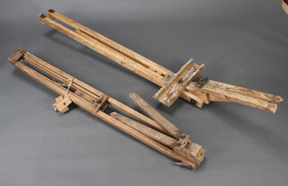 Two beech framed artists adjustable easels - 1 with old but treated worm to the base 155cm h x 197cm 