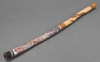 A didgeridoo 153cm l x 5.5cm diam. 