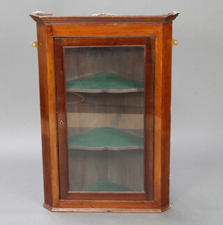 A 19th Century mahogany hanging corner cabinet with moulded cornice fitted shelves enclosed by panelled doors 97cm h x 68cm w x 45cm d 
