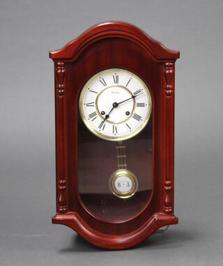 Hermel, a striking wall clock with enamelled dial and Roman numerals contained in a mahogany case 
