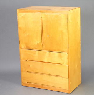 A ply wood tall boy fitted a cupboard above 2 drawers 111cm h x 76cm w x 40cm d 