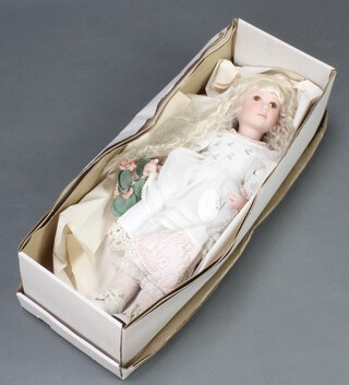 A Knightsbridge Collection limited edition porcelain headed doll "Tricia", boxed