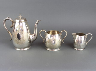 An Edwardian 3 piece engraved silver plated coffee service 
