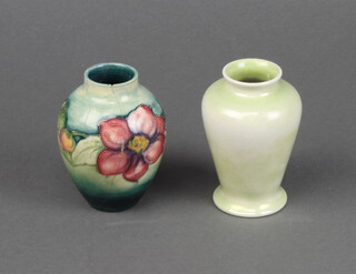 A Moorcroft baluster vase decorated with flowers 9cm (stuck), a green baluster ditto 9cm 