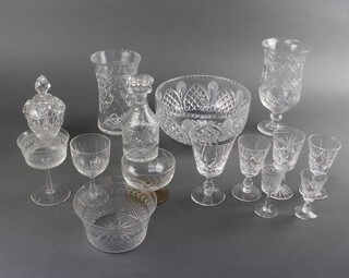 A cut glass pedestal fruit bowl 25cm together with a large quantity ( approx 82 pieces ) of table glassware ( selection shown in photo ) including sundae dishes, finger bowls, 2 cut glass bowl , a jug and various cut glass drinking glasses 