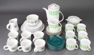 A 1960's Chinese coffee set decorated with bands of green together with a Royal Tudor ware part tea set decorated flowers  