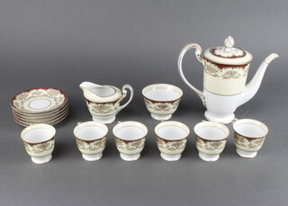A Noritake coffee set with burgundy and gilt decoration 