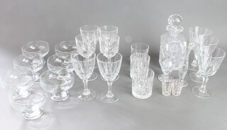 A cut glass spirit decanter and stopper, collection of drinking glasses and sundae dishes  