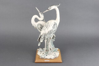 A composition group of herons by G Armani 31cm  