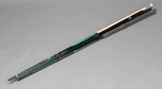A Shakespeare Beta graphite match fishing rod and a ditto Aurora feeder rod 