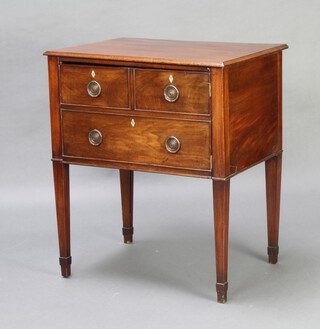 A 19th Century mahogany cabinet fitted a panel door raised on square tapered supports ending in spade feet 74cm x 63cm x 46cm 