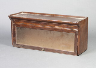 The top section of a 1930's oak Globe Wernicke bookcase 38cm h x 86cm w x 29cm d
