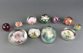A collection of modern paperweights