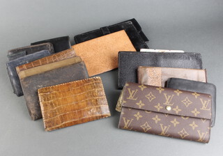 A collection of purses and wallets 