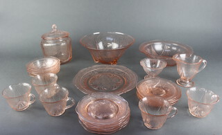 A quantity of pink pressed glassware