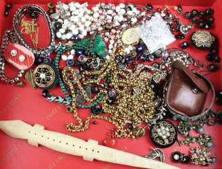 A quantity of costume jewellery including a gilt muff chain 