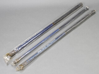 Three vintage Shakespeare fishing poles in plastic tubes 