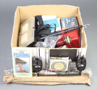 A 1920's 10 piece travel fishing rod, various bite alarms, tackle, reels etc 