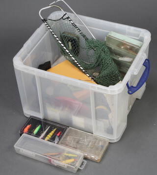 A large box of mixed fishing tackle including lures, bait mounts, Hardy lures etc 