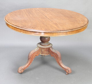 A Victorian circular mahogany snap top breakfast table raised on pillar and tripod base 72cm h x 103cm diam. 