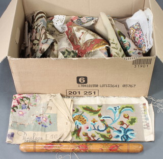 An Art Nouveau carved wooden needle case decorated poppies and a collection of items of Berlin woolwork 