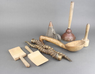 A pair of wooden butter pats and other wooden curios 
