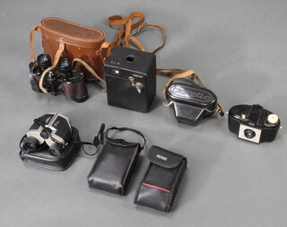 A pair of Deauville 8 x 32 binoculars cased, a no.120 box camera, a Kodak Brownie 127, a Beirette camera, a Panorama wide pic camera, a Minolta Riva twin 28 camera and a pair of binoculars 