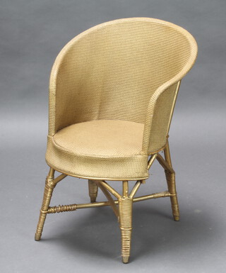 A gold painted loom style chair 