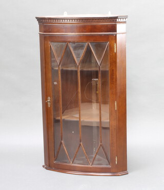Two Georgian style mahogany double corner cabinets, both fitted shelves enclosed by astragal glazed panelled doors above cupboard enclosed by a panelled door 179cm h x 57cm w x 50cm d together with a hanging ditto 98cm h x 59cm w x 38cm d 