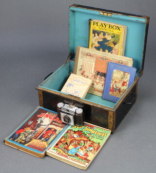 A twin handled metal deed box 19cm x 41cm x 30cm containing a 1921 Playbox Annual, 2 other annuals, 4 cigarette card albums, a Paxina camera 
