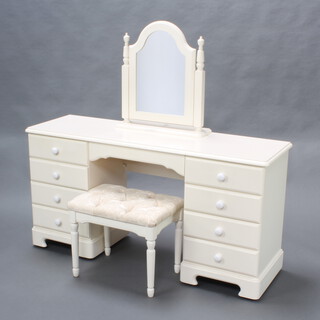 Ducal, a white laminate dressing table with arched plate mirror, fitted 1 long and 8 short drawers  75cm h x 145cm w x 44cm d together with a matching dressing table stool
