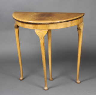 A 1950's walnut finished Queen Anne style demi lune card table 74cm h x 75cm w x 38cm d 