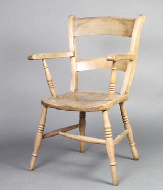 A 19th Century beech framed bar back Windsor chair, raised on turned supports together with a Victorian splat back chair