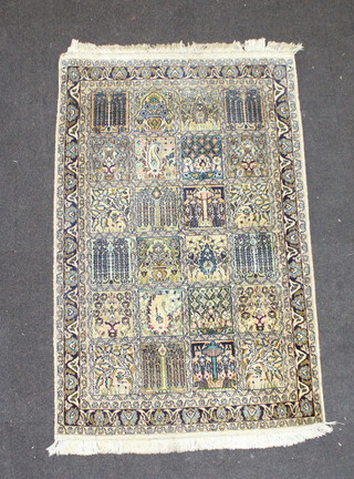 A white and blue silk Persian rug formed of 24 floral square panels 123cm x 76cm 