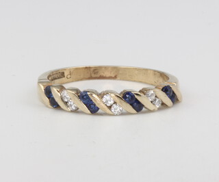 A 9ct yellow gold diamond and sapphire ring 2.5 grams, size P 1/2