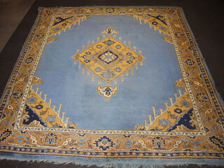 A blue and tan ground Afghan carpet with diamond central medallion within a 3 row border 379cm x 348cm 