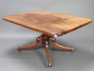 A Victorian bleached mahogany snap top breakfast table, raised on a turned column and tripod base 70cm h x 132cm w x 108cm w  