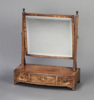 A 19th Century rectangular bevelled plate dressing table mirror raised on a mahogany bow front base fitted 3 drawers, raised on bracket feet 59cm h x 51cm w x 21cm d 