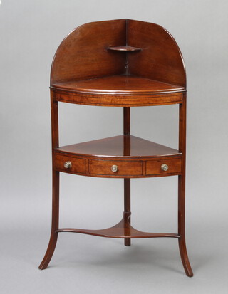 A Georgian mahogany corner wash stand fitted a drawer above undertier, raised on outswept supports 100cm h x 44cm w x 43cm d 
