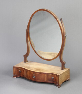 A 19th Century oval plate dressing table mirror contained in a mahogany frame, the inlaid bleached mahogany base of serpentine outline fitted 1 long and 2 short drawers raised on bracket feet 62cm h x 46cm w x 21cm d 