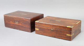 A Victorian rosewood and brass banded writing slope with hinged lid 11cm x 36cm x 23cm together with 1 other with brass inlay 12cm x 35cm x 23cm 