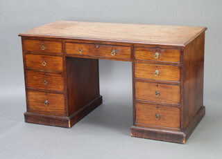 A 19th Century bleached mahogany free standing pedestal dressing table/desk fitted 1 long and 8 short drawers, raised on a platform base 79cm h x 142cm w 67cm d 