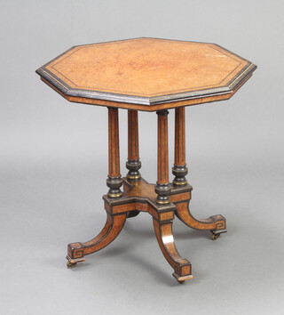 A Victorian octagonal figured walnut, quarter veneered and ebonised occasional table, raised on 4 turned columns with cruciform base, outswept supports 60cm h x 60cm w x 60cm d 